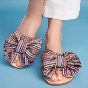 Jeffrey Campbell Rigalo striped bow slide sandals.